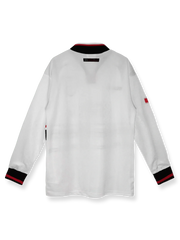 1998/99シーズンのマンチェスター・ユナイテッドのアウェイ白長袖シャツ、シンプルでクラシックなデザインを示す