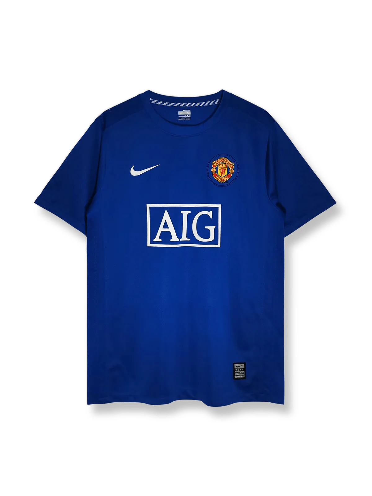 2006–07シーズンマンチェスター・ユナイテッドアウェイジャージ、ホワイトにグレーダイアゴナルストライプとブラックアクセントを配したモダンデザイン。