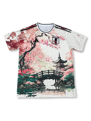 2025–26シーズン日本代表桜吹雪グラフィックユニフォーム、白地に淡いピンクの桜吹雪パターンを散りばめたモダンデザイン。