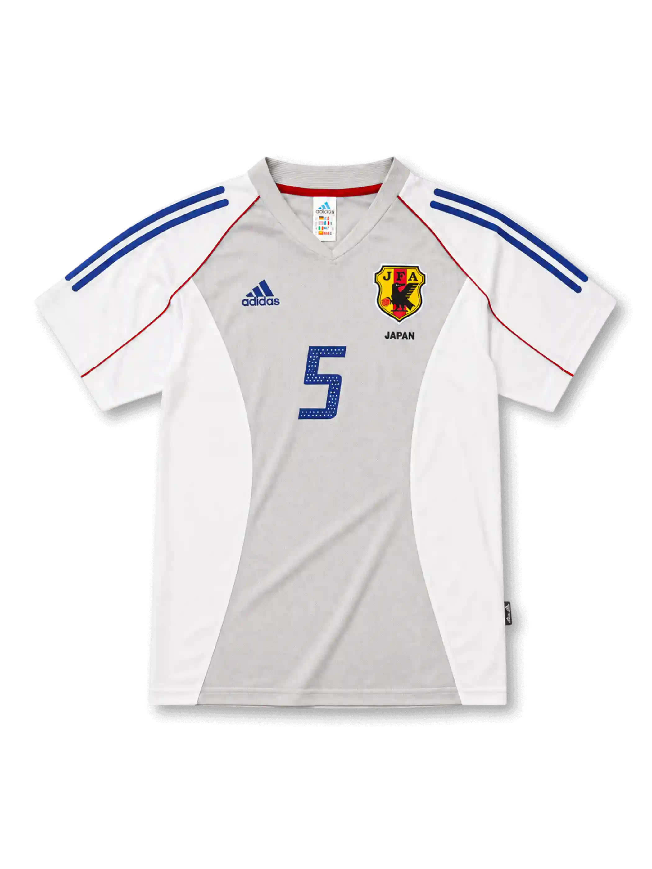 日本代表2002-04アウェイユニフォーム前面・ホワイト×グレーのパネル構成にブルーの2本ラインとレッドのパイピング、旧JFA八咫烏エンブレムとJAPAN表記、中央にブルーの背番号5