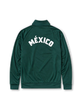 2026年メキシコ代表ヘリテージトラックジャケット、ダークグリーンのボディに代表エンブレム、トレフォイルロゴ、赤白の袖ライン、背面のMÉXICOロゴを備えたデザイン。