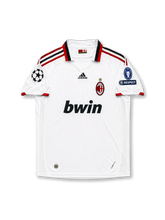 ACミラン 2009-10 アウェイ UEFAチャンピオンズリーグ仕様 ロナウジーニョ80番 フロント(ホワイト×レッド×ブラック・ショルダーストライプ+bwin+ACMクラブクレスト+UCLスターボールパッチ+7回優勝記念バッジ+UEFA RESPECT)