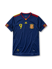 ネイビーベースに肩のイエロー×レッド2本ラインを配し、胸にadidasロゴ、イエローの9番、スペインサッカー連盟のクラブエンブレム、裾にCLIMACOOL表記を備えたスペイン代表2010ワールドカップアウェイジャージ正面
