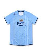 マンチェスター・シティ 2007-08 ホーム ユニフォーム スカイブルー 白ピンストライプ Thomas Cook.com ル・コック・スポルティフ