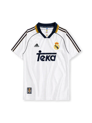ホワイトベースにネイビー・ゴールドのスリーストライプ、REAL MADRIDロゴ入りのポロ襟、左胸のadidasロゴ、右胸のレアル・マドリードクラブエンブレム、中央のネイビーのTekaスポンサーロゴを備えたレアル・マドリード1998/00ホームジャージ正面