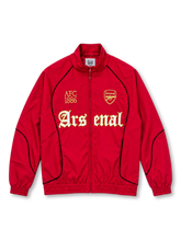 アーセナル グラフィック モックネックジャケット レッド ゴシック体のArsenalロゴ AFC 1886の刺繍 金色のクラブエンブレム