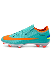 Nike Mercurial/マーキュリアル FG ターコイズのサッカースパイク、オレンジのスウッシュとピンクのAIR ZOOMソール面
