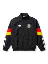 ドイツ代表 トラックジャケット adidas Originals レトロ 正面 — ブラック×国旗三色スリーブバンド、トレフォイルロゴ、DFB鷲エンブレム
