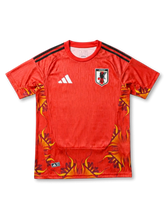 日本代表 2026/27 GKジャージ Authentic 正面 — 赤地×炎グラフィック、JFAエンブレム