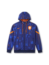 オランダ代表 Nike ウィンドランナージャケット ネイビーグラフィック — 幾何学総柄パターンとオレンジのライオンエンブレム刺繍を配した公式トレーニングライン