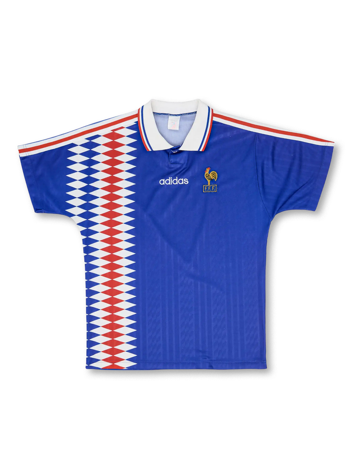 1994–96年フランス代表ホームジャージ、胸に配されたトリコロールストライプとVネックが特徴のクラシックデザイン。