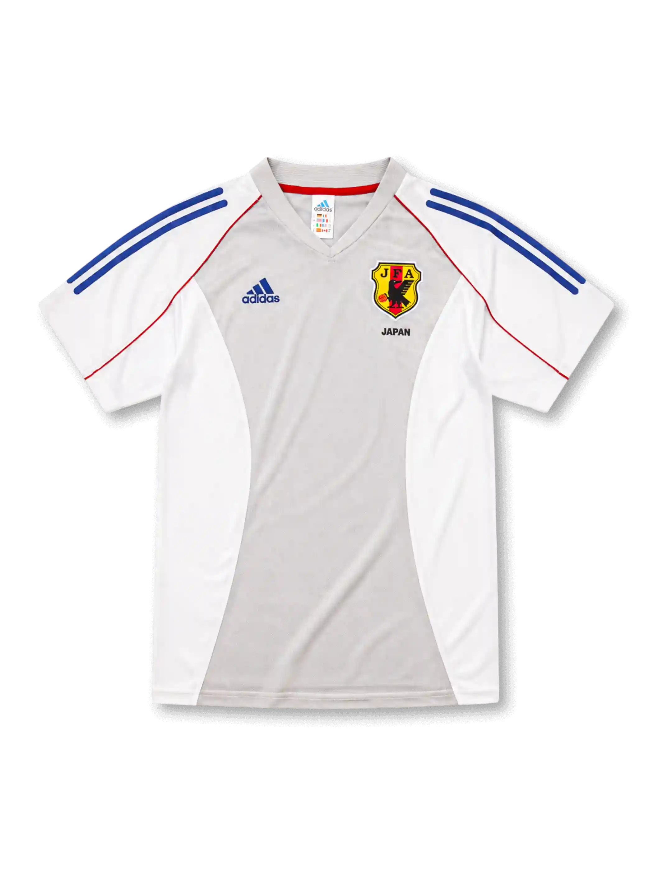 日本代表2002-04アウェイユニフォーム前面・ホワイト×グレーのパネル構成にブルーの2本ラインとレッドのパイピング、グレーのVネック、左胸adidasロゴ、右胸に旧JFA八咫烏エンブレムとJAPAN表記