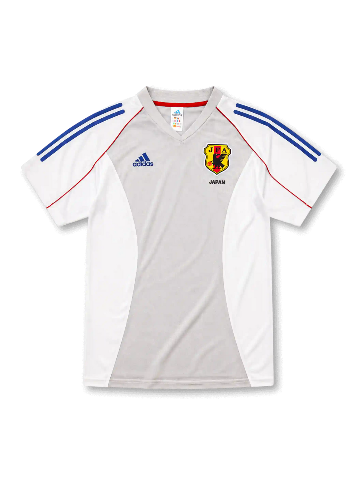 日本代表2002-04アウェイユニフォーム前面・ホワイト×グレーのパネル構成にブルーの2本ラインとレッドのパイピング、グレーのVネック、左胸adidasロゴ、右胸に旧JFA八咫烏エンブレムとJAPAN表記