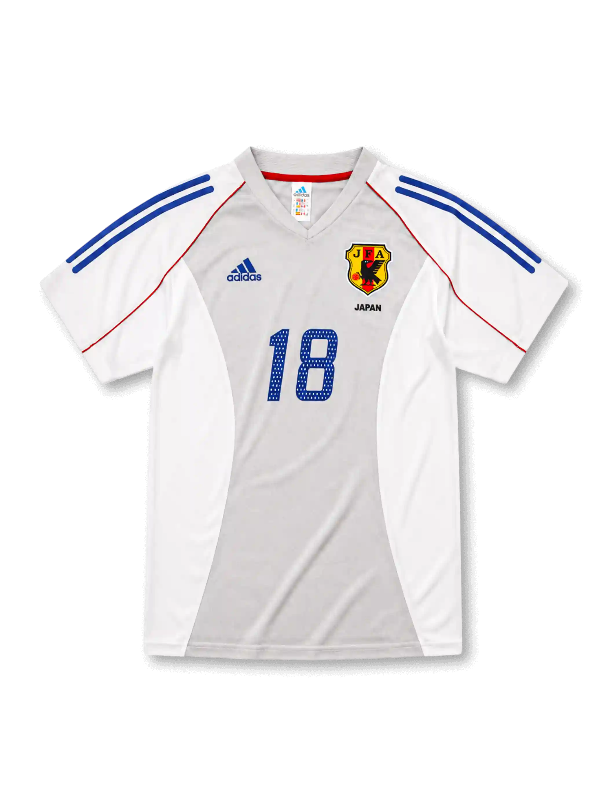 日本代表2002-04アウェイユニフォーム前面・ホワイト×グレーのパネル構成にブルーの2本ラインとレッドのパイピング、旧JFA八咫烏エンブレムとJAPAN表記、中央にブルーの背番号18