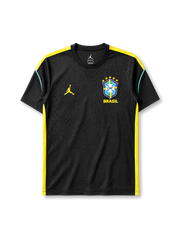 ブラジル代表2026ワールドカップ オーセンティックトレーニングシャツ正面、ブラック地にイエローショルダーライン、右胸にCBFエンブレムとBRASILロゴ、左胸にイエローのジャンプマンロゴ、両サイドに蛍光イエローパネル