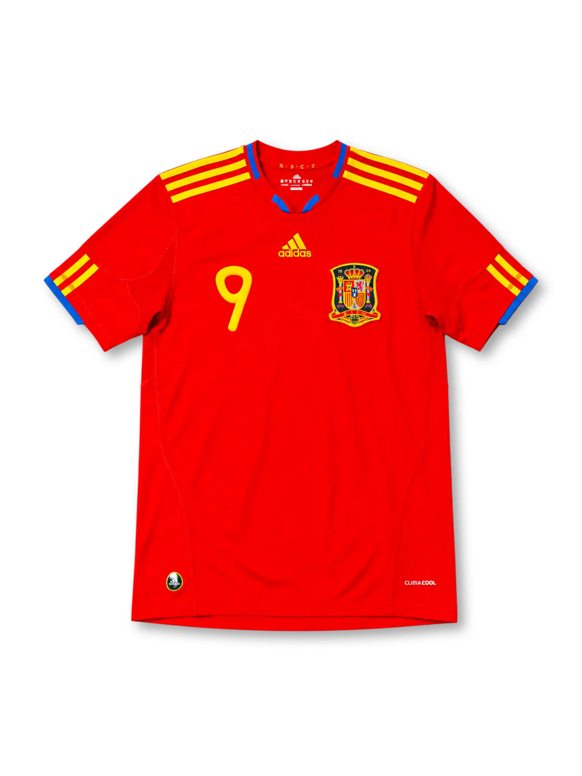 レッドベースに肩と両袖のイエロー3本ラインとブルー襟を配し、胸にadidasロゴ、イエローの9番、スペインサッカー連盟のクラブエンブレム、裾にCLIMACOOL表記を備えたスペイン代表2010ワールドカップホームジャージ正面