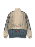 イングランド代表 2026 ナイキ×パレス トラックジャケット ベージュ 十字のグラフィック グレーのパネル スリーライオンズのエンブレム