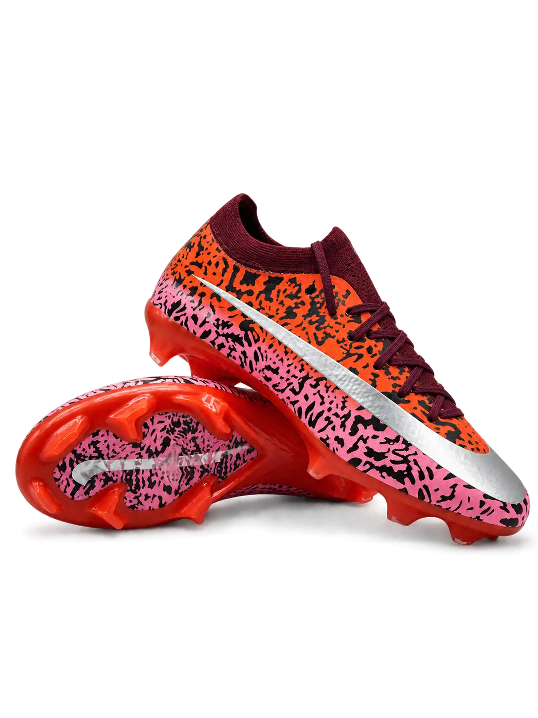 Nike Mercurial/マーキュリアル FG オレンジとピンクのサファリ柄サッカースパイク、シルバーのスウッシュとレッドのソールプレート