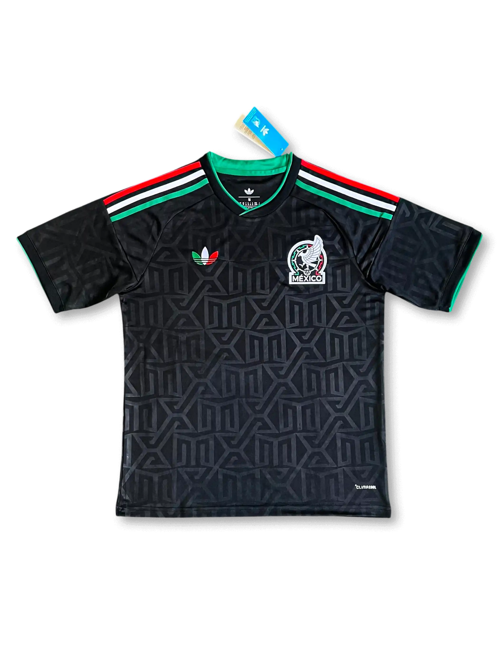 メキシコ代表 2026 アウェイジャージ Originalsトレフォイルエディション レプリカ 正面 — ブラック×MXモノグラム、国旗三色3ストライプ、トリコロールトレフォイル、FMFエンブレム、タグ付き