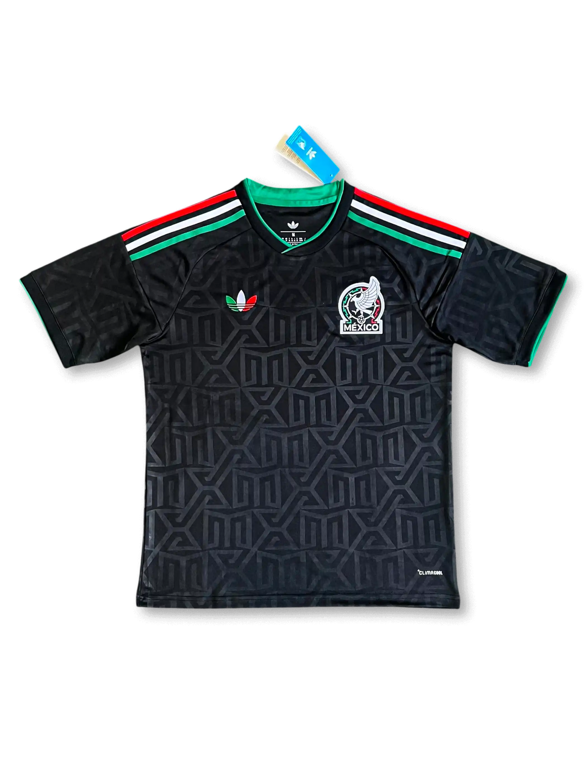 メキシコ代表 2026 アウェイジャージ Originalsトレフォイルエディション レプリカ 正面 — ブラック×MXモノグラム、国旗三色3ストライプ、トリコロールトレフォイル、FMFエンブレム、タグ付き