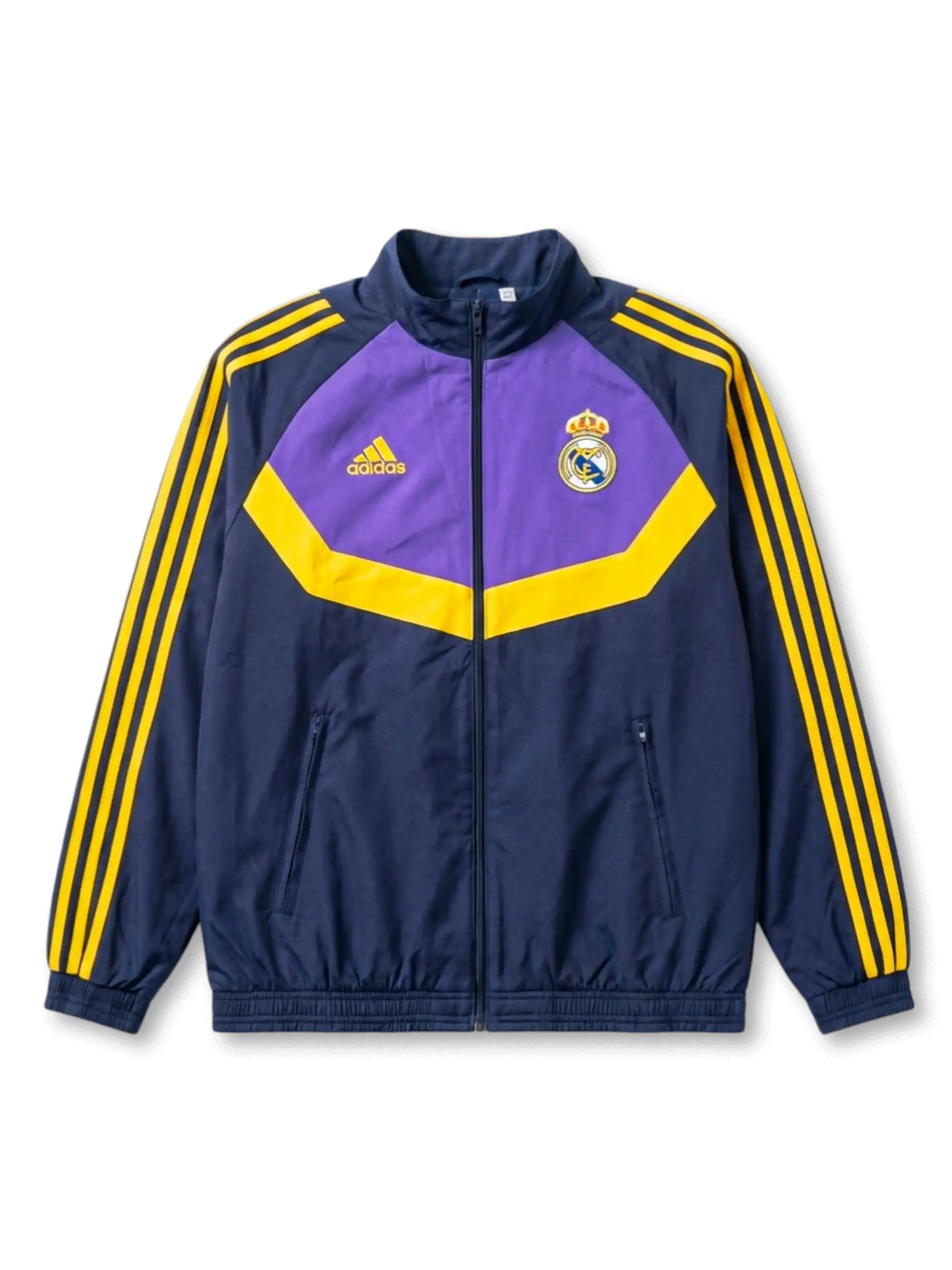 レアル・マドリード adidas リバーシブルウィンドブレーカー ネイビー面 — ミニマルな無地構成とクラウンエンブレム縦配置刺繍